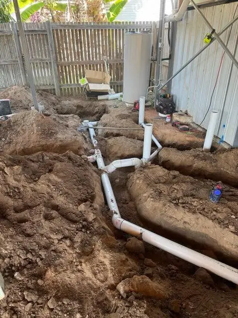 Underground drainage pipework laid in an open trench